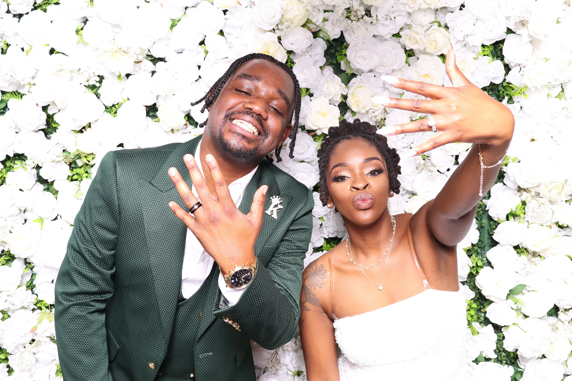 Newlyweds celebrating at a RicheMoments wedding photo booth