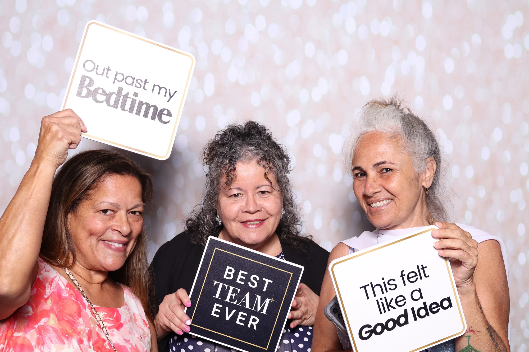 MADD Central Florida gala guests posing with playful signs