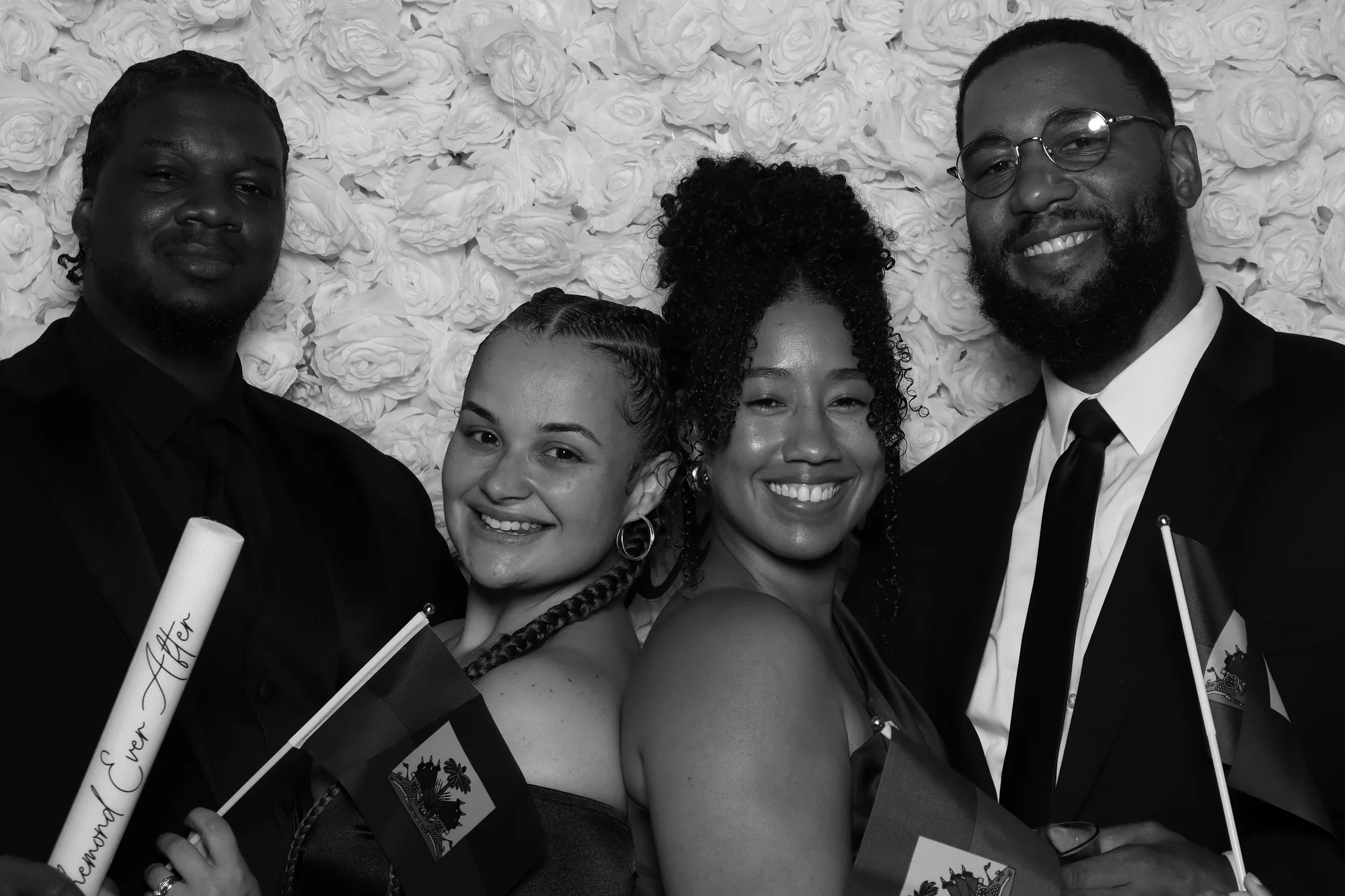 Black-tie wedding guests at the Richemond Ever After photo booth