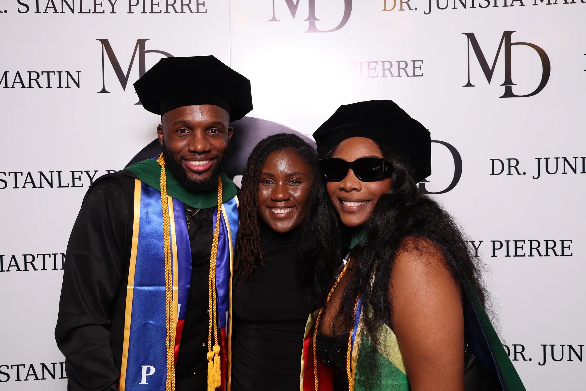 Guests celebrating a milestone birthday with the Luxe Signature photo booth experience